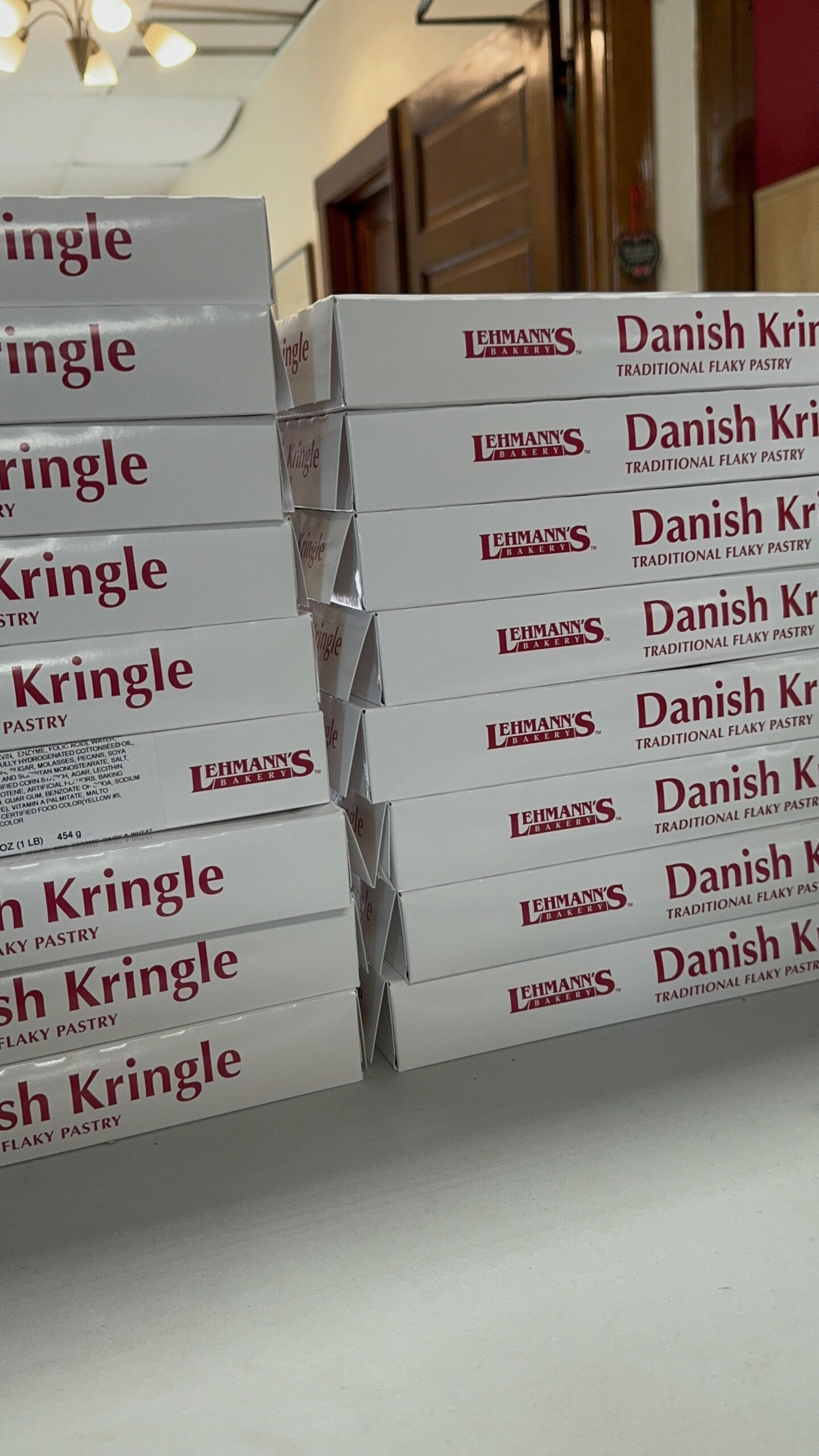 Stacked boxes of Lehmann's Bakery Danish Kringle pastries